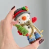 Tradução Boneco de Neve - Amigurumi